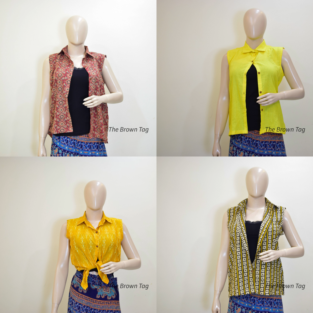 Four mannequins wearing sleeveless tops with different patterns on a white background.